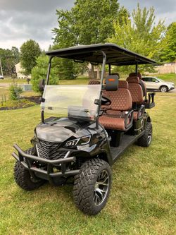 6 seater lifted golf cart. Sdlool with off road package