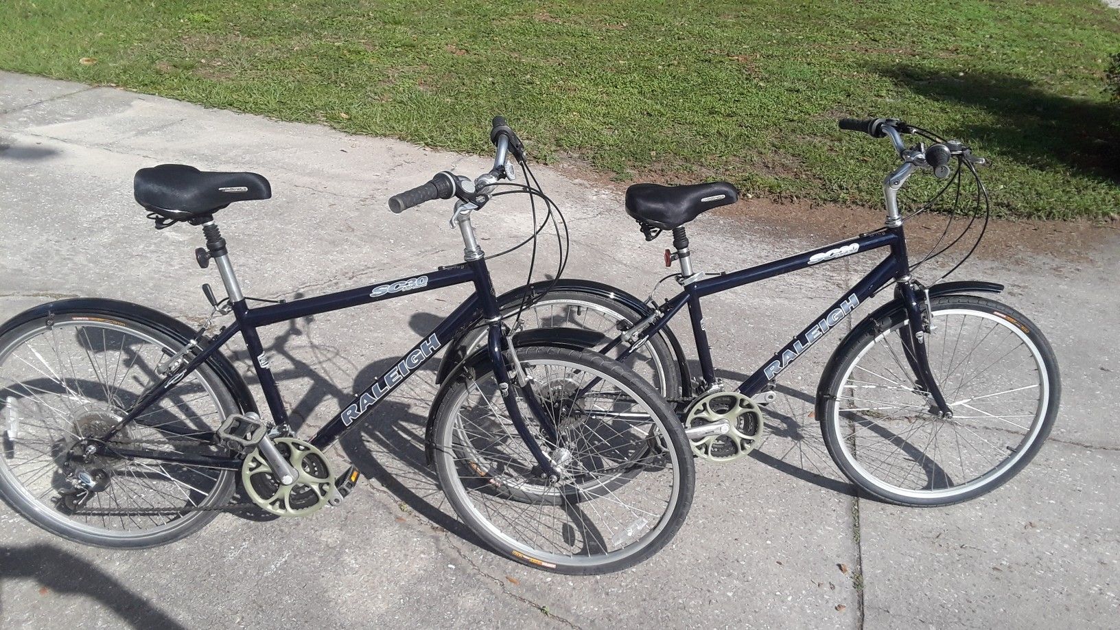 2 Raleigh SC30 Sport Comfort 21 speed bikes with new 26" hybrid tires, 17" frames.