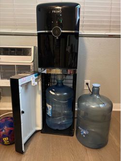Dispensador de agua con dos galones