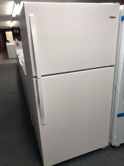 New scratch and dent whirlpool 21 cu ft top and bottom fridge. 1 year warranty