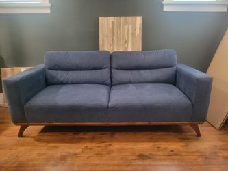 Blue oversized loveseat sofa couch