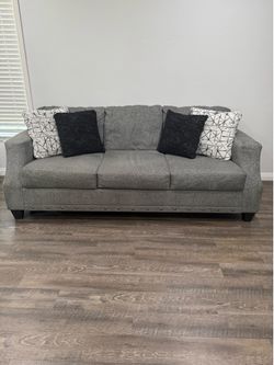 Grey couch 3 cushions