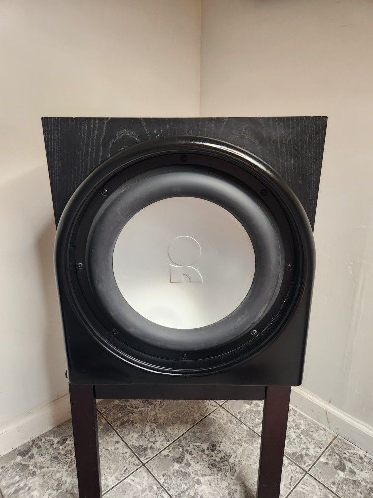 Revel B15 powered subwoofer. It has a 15" kevlar woofer and a 1000 watt internal amplifier.