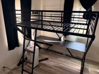 Full size frame and attached desk with ladder