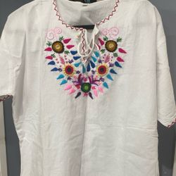 White cotton blouse with embroidery