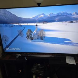 LG 70” 4K UHD Smart TV with Wall Mount & Legs – Excellent Condition