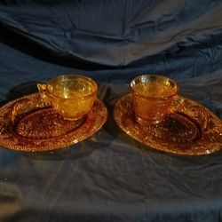 A Set Of Two Amber Antique Sandwich And Cup Plates