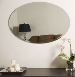 31” x 21” oval beveled frameless wall mirror