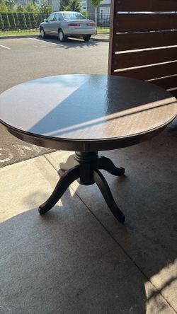 Circular wooden table