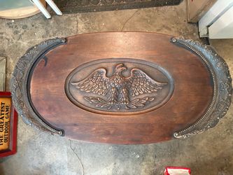 Antique small oval coffee /decoration table with carved eagle