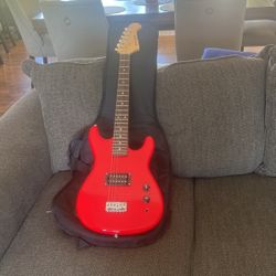 Guitar And Brand New Guitar Case