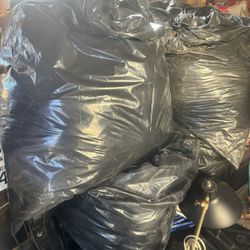 Bags If Mixed Size Clothes Men And Women And Children 