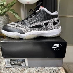 Jordan 11 Low IE Black Cement