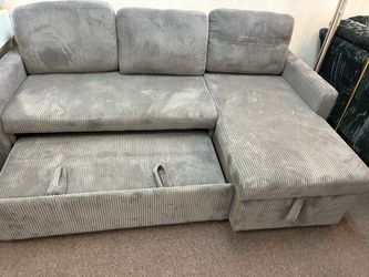 Sectional sofa with pull out bed and storage 84”