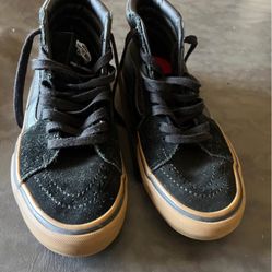 Vans black suede shoe, men's size 7. White strip with white laces (missing one lace). Shoes are brand new, never worn. Son's foot size grew too fast! 