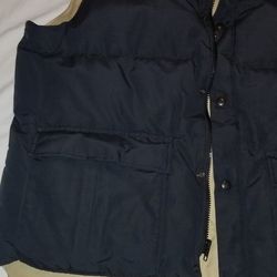 Woolrich Down Vest. Vintage Made In The USA. Size Large. Zips And Snap Closure. Great Condition
