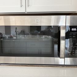 GE JVM6172SKSS 1.7 Cu. Ft. Over-the-Range Microwave Oven Stainless Steel Bundler