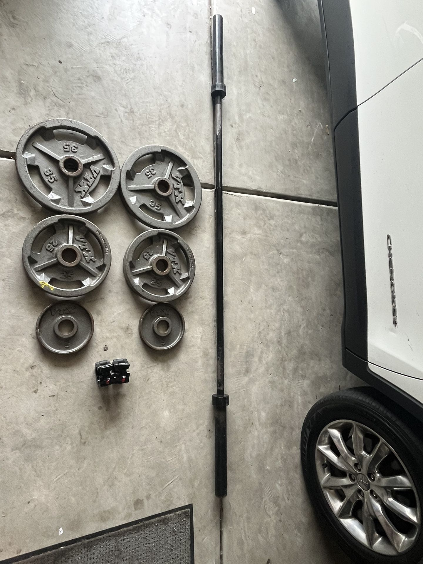 Weight bar + 130lbs+ Clamps