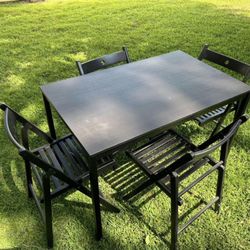 Dining table with 4 foldable chairs 