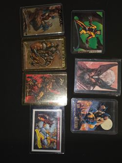 7 wolverine  cards  1 is a 1/1 scetch card