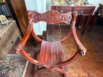 Ornate solid cherry wood chair and desk.
