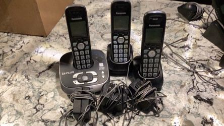 set of hardline Panasonic phones-with answering base