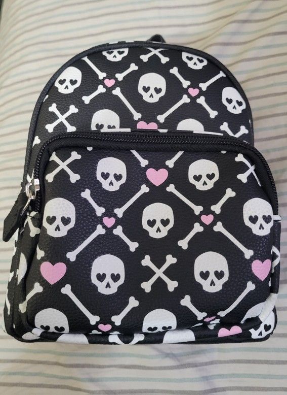 CLAIRE'S SKULLS/CROSS BONES PINK HEART MINI BACKPACK FOR $20