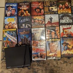 DVD Player and 18 DVD's