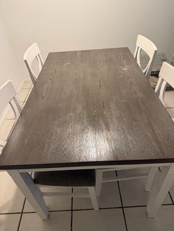 Dining table with 4 chairs—make me an offer.