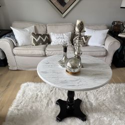 Hervey French Country Round Pedestal Coffee Table – Distressed White Top & Black Base 