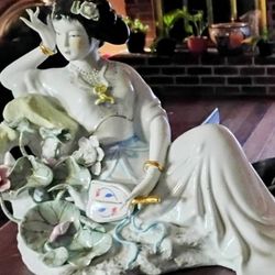 4. Porcelain Hand Painted Figurines 