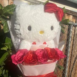 Hello kitty with big plushie and eternal roses