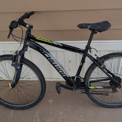 Schwinn Ranger mountain bike, Front suspension26" tires, 18"frame, 21 speed,needs rear tube And Some Adjustments