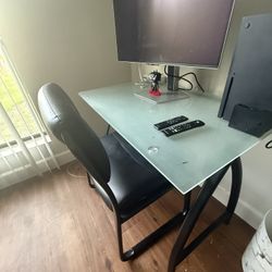 GLASS DESK AND LEATHER CHAIR 