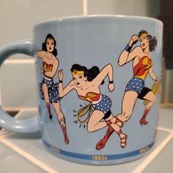 2015 DC Comics Wonder Woman "Through the Years" Cup/ Mug (1940's Thru 2010's)