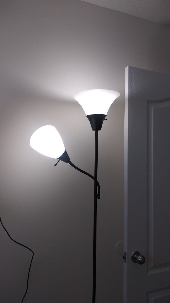Floor lamp with two . Brand new.