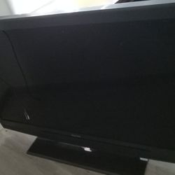 Nice Black 55" Auria Tv With Wood TV Stand 