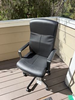 Black Faux Leather High-Back Executive Office Chair.