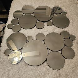 Abstract bubble mirrors.