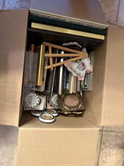 Picture frames all different shapes and sizes