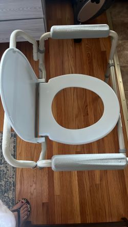 Portable toilet chair.