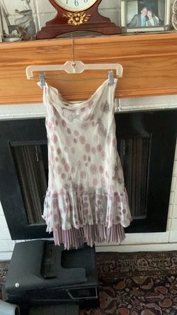 Light purple skirt/pleated with design (petite-small). Silky polyester .