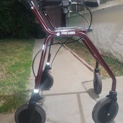 Dolomite Legacy Rollator walker, which is a mobility aid designed for both indoor and outdoor use. 
Key features and information about this rollator i