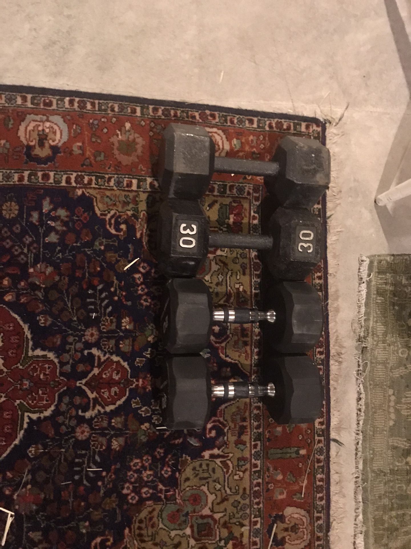 Two 30 pound and Two 20 pound dumbbells.