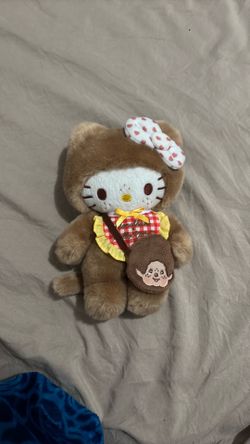 Hello kitty monchichi plush