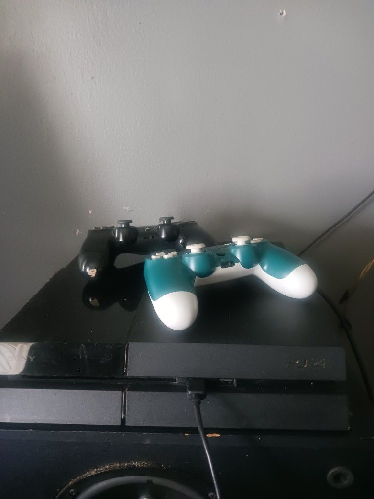 PS4 With Two Controllers And One Game X