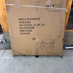 New Folding Table/4 Chairs 