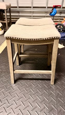 Pair of counter height backless bar stools