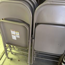 8 Folding Chairs 