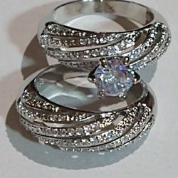 *SET*ENGAGEMENT/WEDDING./OR WEAR SEPARATELY ON DIFFERENT FINGERS TWO PIECE RICH WHITE SHIMMERY ZIRCON, THROUGH BOTH RINGS AND MAIN STONE/ SILVER. 9